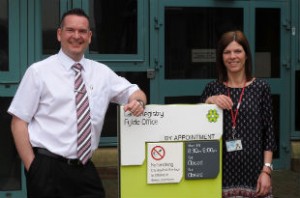 Chris and Chris from the Land Registry outside their office