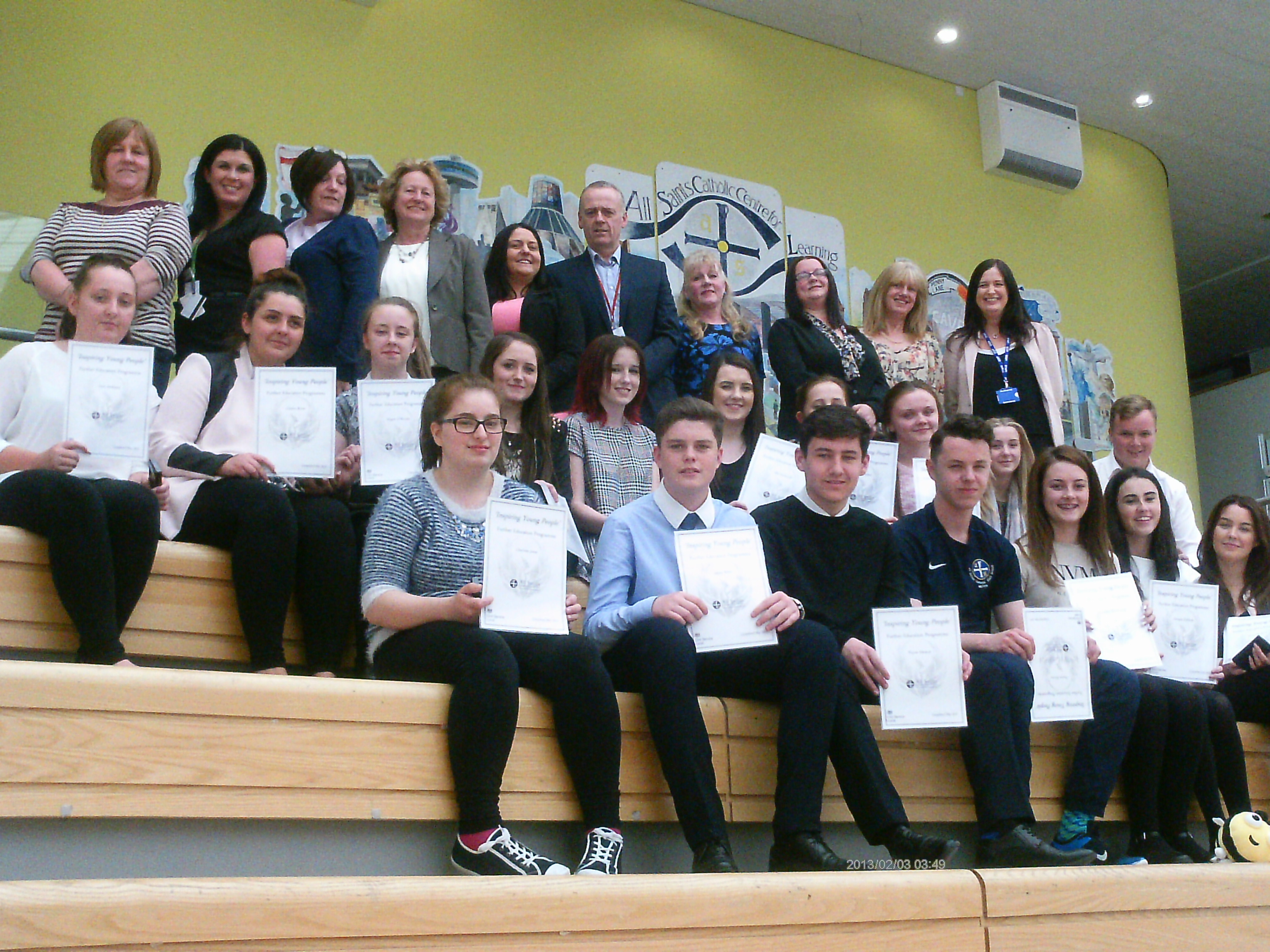 Students with certificates and mentors