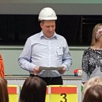 Man in a builder's safety helmet