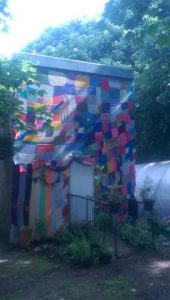 Citizens covered the day centre's shed in knitted squares