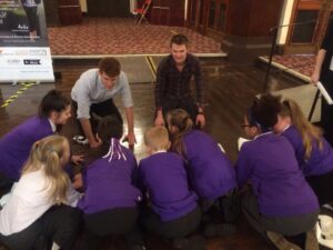 Children kneeling on floor 