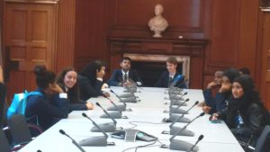 Students round a table