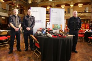 Border Force officers at a display stand