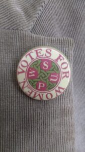 Badge with wording 'Votes for women'