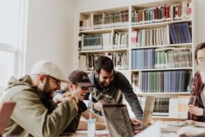 group of people working at a computer