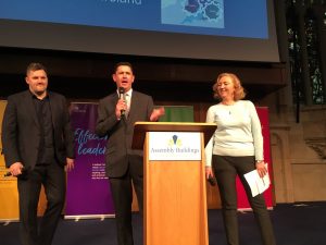 Neil, Lynn and Andy on podium at opening event