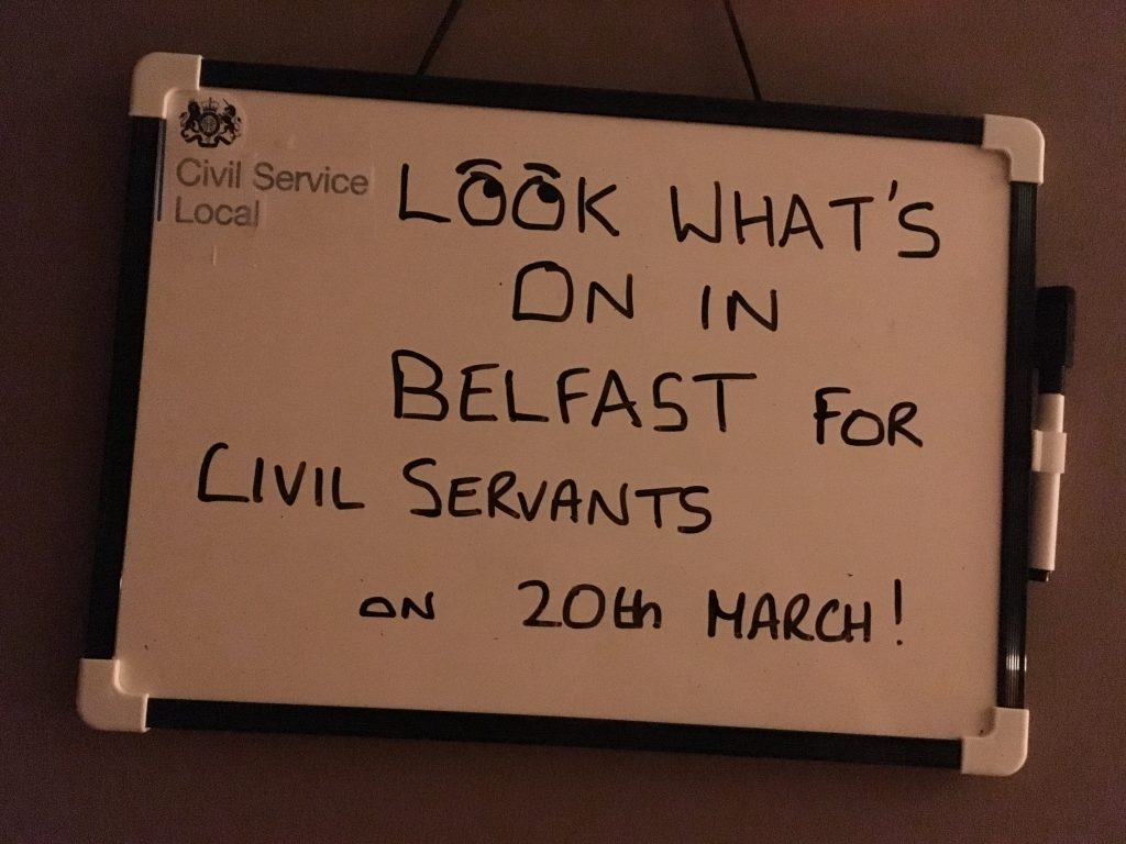 Whiteboard with writing - look what's on in Belfast for civil servants on 20th March