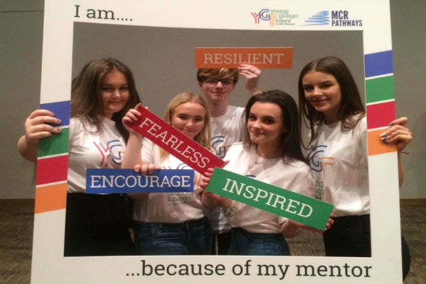 5 young girls looking through a frame saying I am resilient, fearless, inspired and encouraged because of my mentor