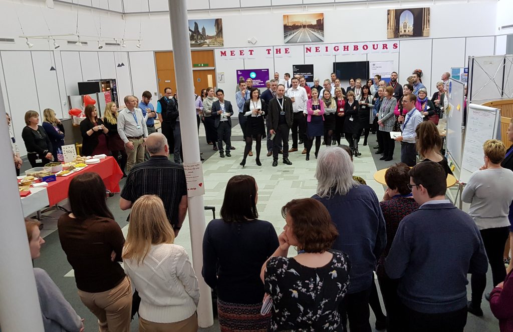 Group of people Standing and interacting in a event