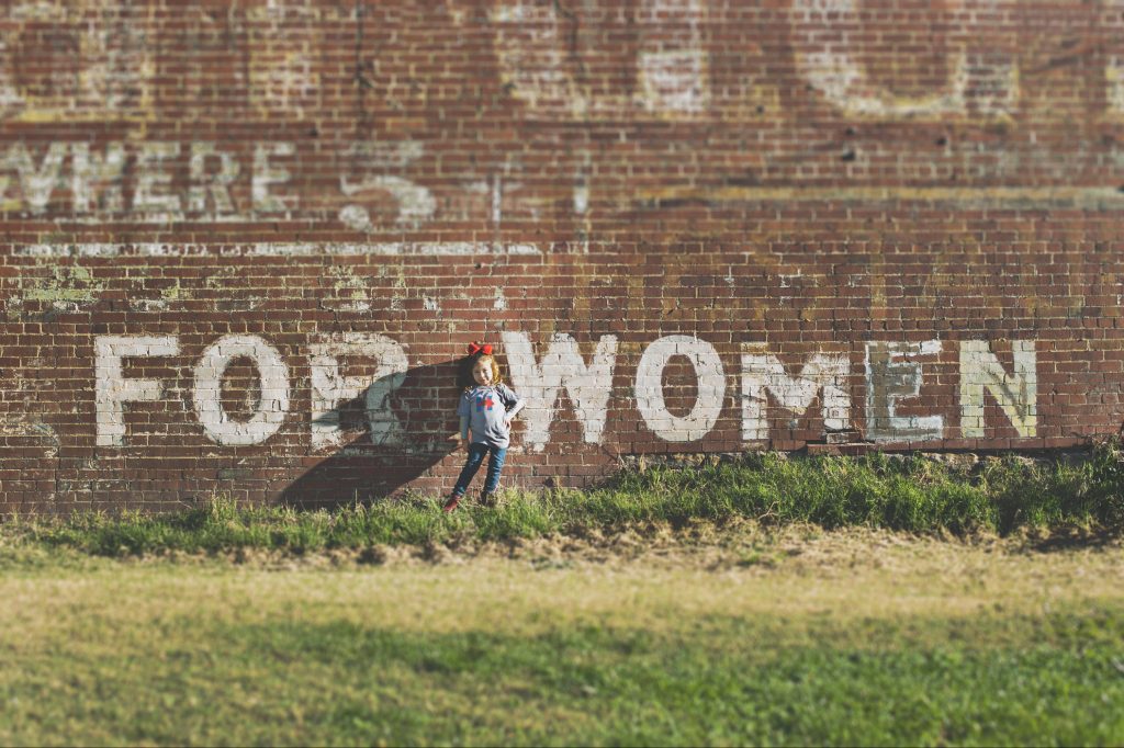 brick wall with the words 'for women'